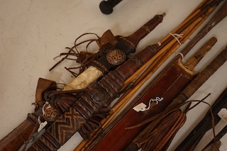 A quantity of African tribal spears swords and tools. Condition - varies